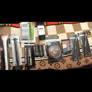 Selling this huge bundle of wet n wild cosmetics